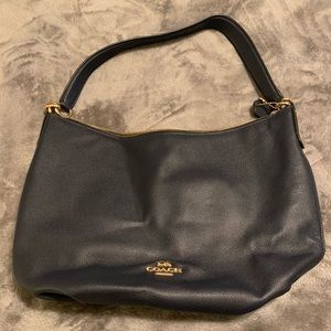 Medium size Leather Coach bag trimmed in gold